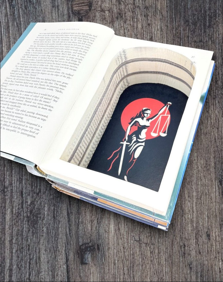 John Grisham - book stack - Secret Storage Books