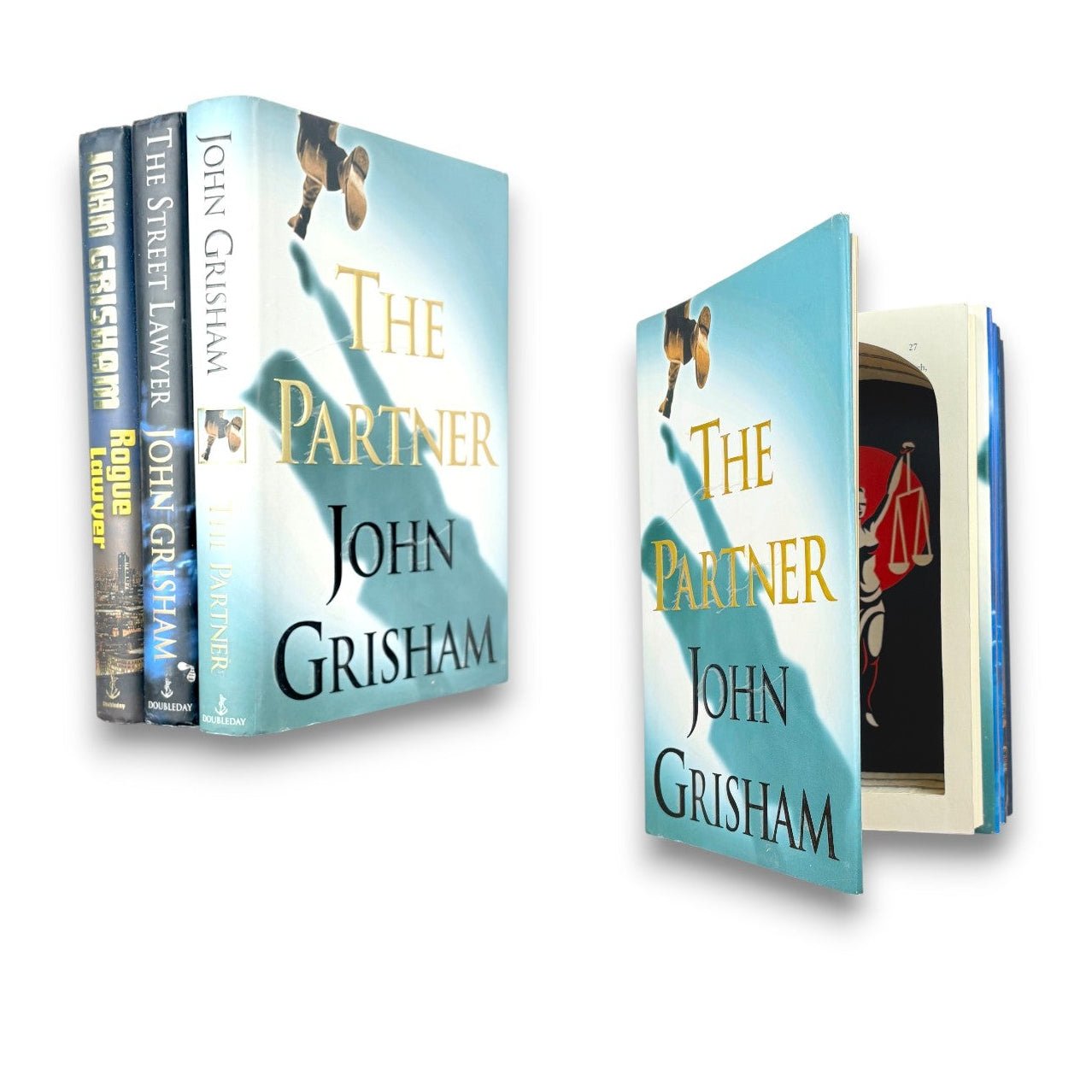 John Grisham - book stack - Secret Storage Books
